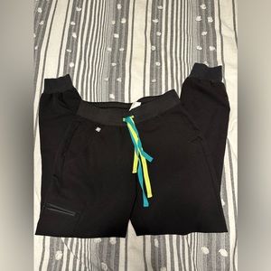 Limited edition black Zamora figs joggers with neon green and blue strings